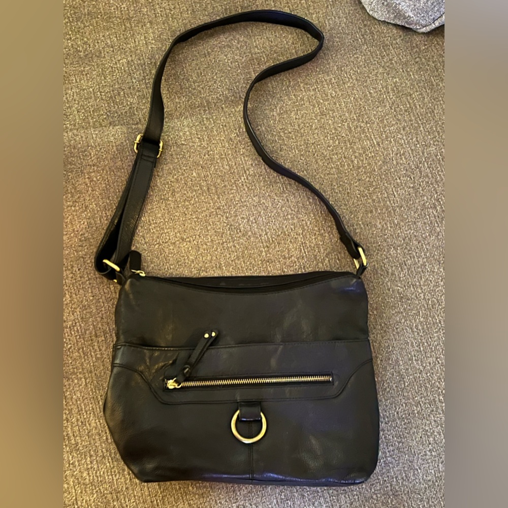 Black leather bag “Great American Leather Works.” Brass. Buttery. VG condition.